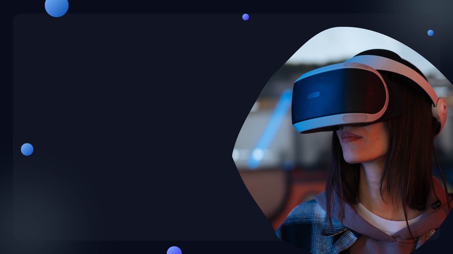 Woman wearing Virtual Reality Goggles staring into the Distance.